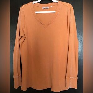 Belle by Kim Gravel V-Neck Top in a Distressed Burnt Orange Coloring.